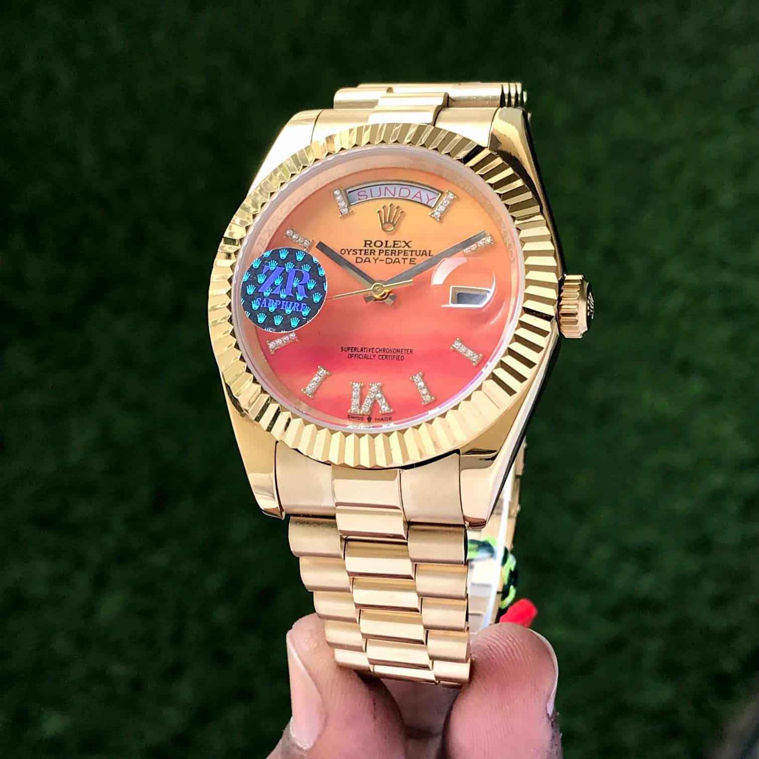 Rolex Day-Date President Yellow Gold Carnelian Orange Diamond Roman Dial Japanese Automatic Men’s Watch