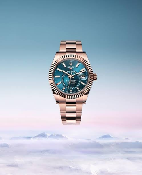 Rolex SkyDweller Rose Gold Blue Dial Oyster Chain Automatic Mens Watch